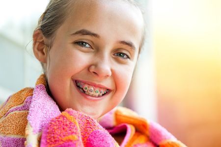 girl with braces smiling