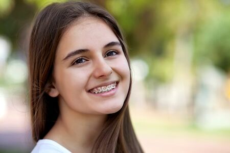girl smiling after receiving orthodontic services in Burleson, TX